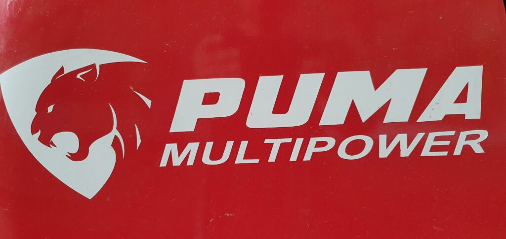 Puma Multipower Logo. Radlader. Bagger. Minibagger